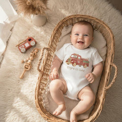 Firefighter Baby Outfit, Engine Co. Cutie Onesie®, First Responder Shower Gift, Baby Shower Gift, Fireman Baby Reveal, Fireman Baby Theme. Your little hero just rolled onto the scene! This “Engine Co. Cutie” onesie is the perfect outfit for firefighter families and first responder parents who want to celebrate their newest recruit. The cozy fit and vintage firetruck design make it a heartwarming baby shower gift or everyday outfit for your brave little cutie.