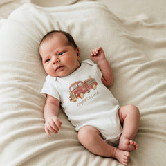 Firefighter Baby Outfit, Engine Co. Cutie Onesie®, First Responder Shower Gift, Baby Shower Gift, Fireman Baby Reveal, Fireman Baby Theme. Your little hero just rolled onto the scene! This “Engine Co. Cutie” onesie is the perfect outfit for firefighter families and first responder parents who want to celebrate their newest recruit. The cozy fit and vintage firetruck design make it a heartwarming baby shower gift or everyday outfit for your brave little cutie.