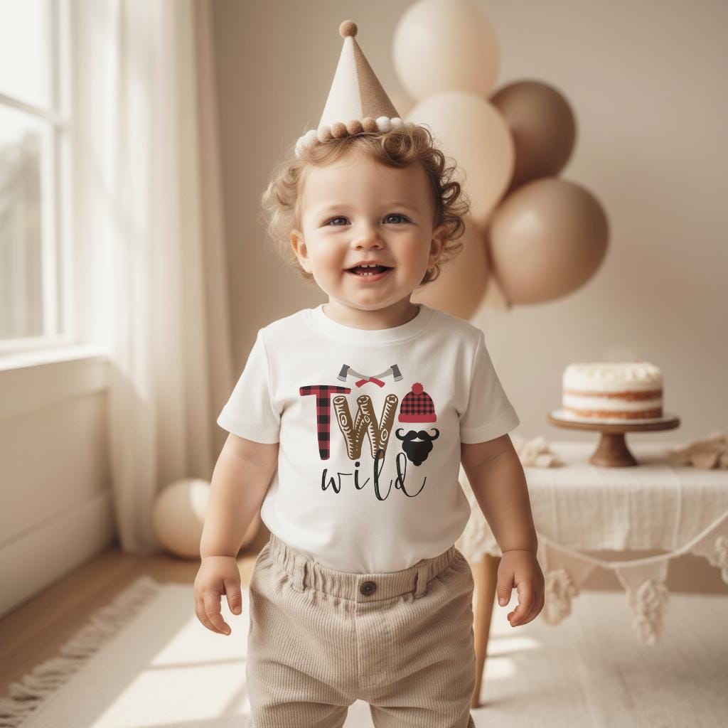 Two Wild Birthday Shirt.  This adorable Lumberjack Theme Birthday Boy design features a black beard with a lumberjack beanie and buffalo plaid accents and some lumberjack axes.  The words read "Two Wild"  This is such an adorable shirt for your little man's birthday celebration!  Makes a great birthday gift for the little lumberjack in your life!