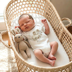 Aries zodiac baby onesie with a soft boho watercolor design on a bright white background. Unisex astrology baby outfit perfect for March and April birthdays, newborn photos, baby shower gifts, horoscope-themed milestone pictures, and gender-neutral baby clothing. High-quality printable Aries zodiac artwork for infant apparel.